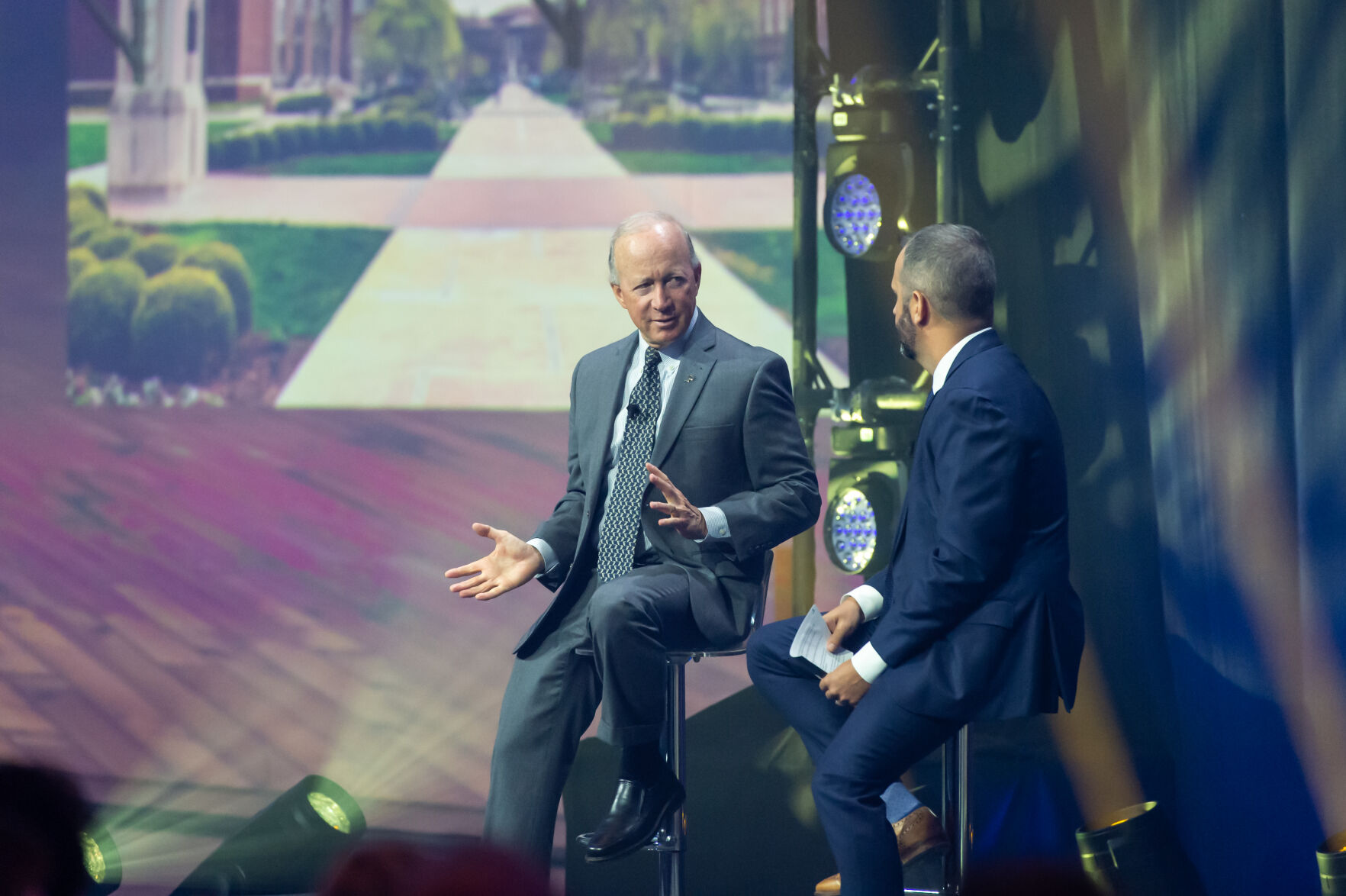 10/13/21 Saab Grand Opening, Purdue President Mitch Daniels talks to Robert UlibarrÃ